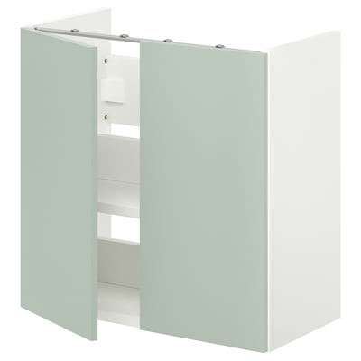 ENHET sage green bathroom cabinet with shelves.