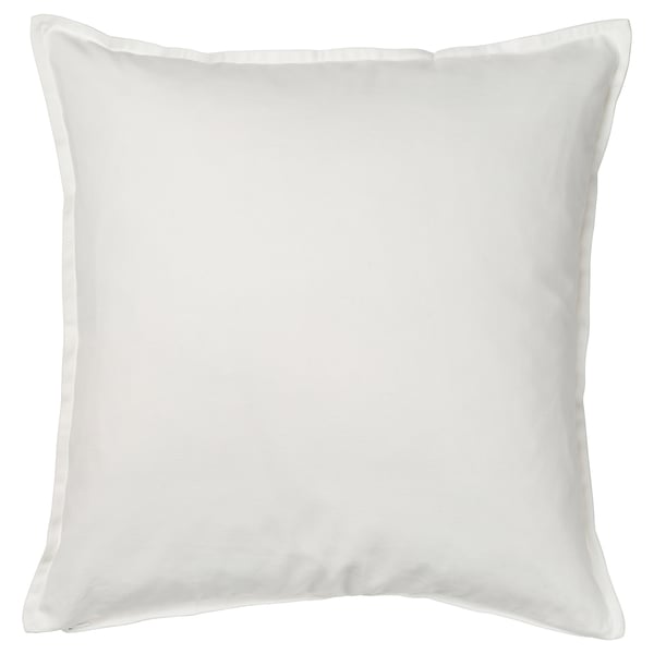 A white, square FACELIOR cushion cover. Made of 100% cotton, it an embroidered floral design inspired by traditional swedish crafts.