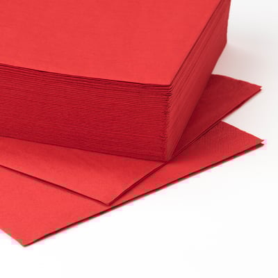 A stack of red FANTASTISK napkins, neatly folded, square shape.