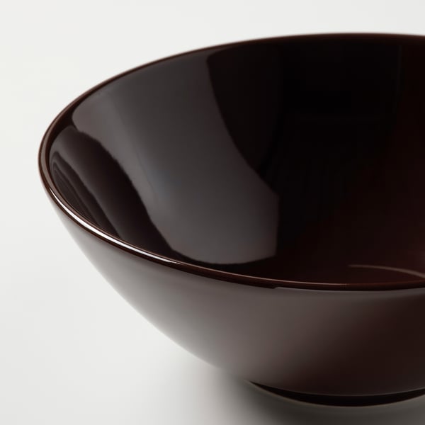 Dark glossy bowl, smooth edge, elegant shape.