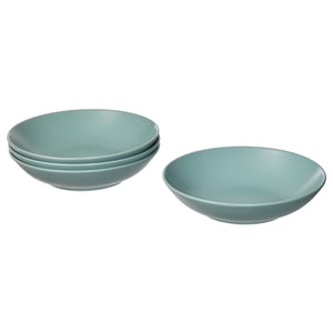 Four FÄRGKLAR green stoneware bowls, deep blue-green colour, simple design, stacked and separate.