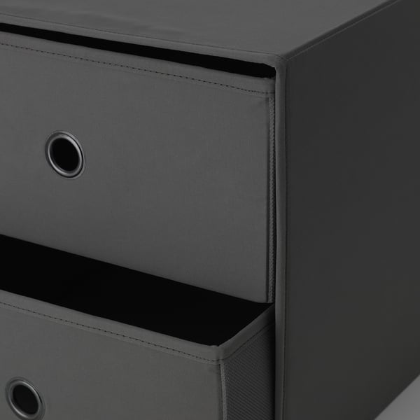 Small grey storage chest with two drawers, one with a handle and the other open, showcasing good quality fabric and construction.