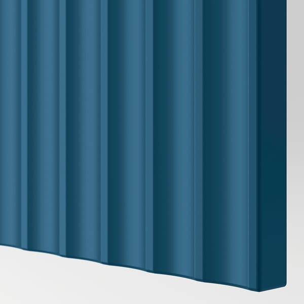 A close-up of a deep-blue door with a smooth, milled surface, showcasing high-quality craftsmanship and a sophisticated look.