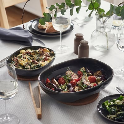 GLADELIG: 2 dark-gray oven dishes, stoneware, oval shape, elegant design.
