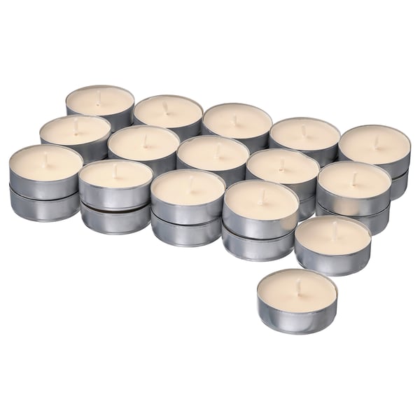 Set of white, tealight candles in silver holders arranged neatly.