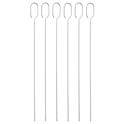 Six silver skewers with looped handles, laid neatly side by side, ideal for grilling.
