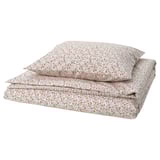 Folded floral bedding set, light colors. Tiny flowers, cotton/viscose mix. Soft, breathable, fresh design.