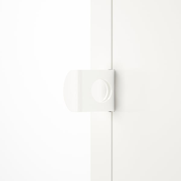 White modern storage cabinet with rounded edges and a lock, mounted on a wall. Sleek, minimalist design.