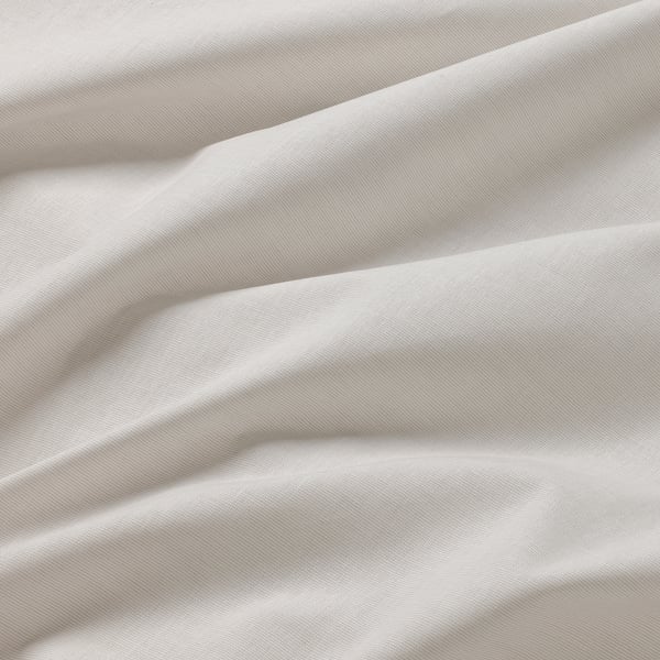 Light, smooth fabric shown, likely 100% cotton. Texture suggests quality, suitable for curtains.