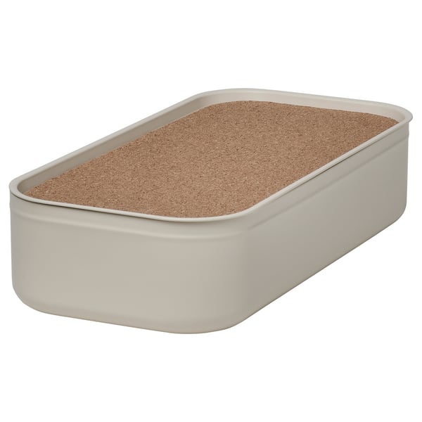 A HARVMATTA light beige metal storage box with a cork lid, rectangular in shape, ideal for organizing desk accessories.