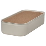 A HARVMATTA light beige metal storage box with a cork lid, rectangular in shape, ideal for organizing desk accessories.