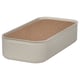 A HARVMATTA light beige metal storage box with a cork lid, rectangular in shape, ideal for organizing desk accessories.
