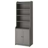 A gray HAUGA storage cabinet with an open top and two closed doors, ideal for versatile home use with a traditional design.