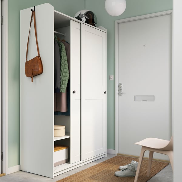 HAUGA white wardrobe, hinged & sliding doors, mixed storage, wall-mounted, light & functional.