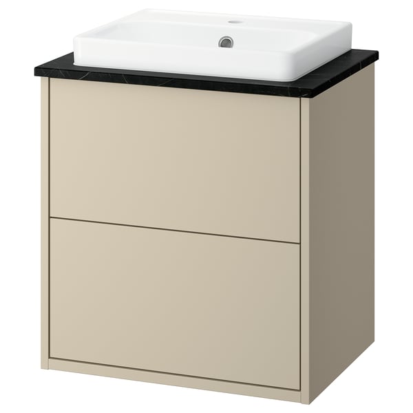 A beige HAVBÄCK bathroom vanity with a black countertop and a white basin. The design is clean and modern.
