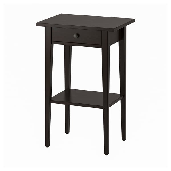 A dark brown HEMNES side table with a single drawer and a lower shelf, made of solid wood.