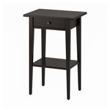 A dark brown HEMNES side table with a single drawer and a lower shelf, made of solid wood.