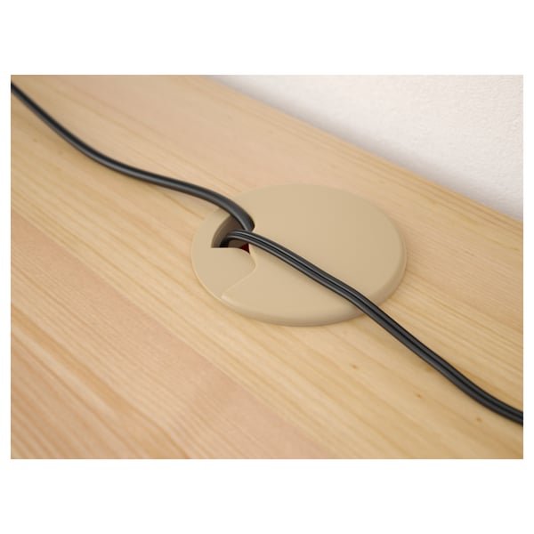 Wooden desk with built-in cable outlet, managing wires neatly.
