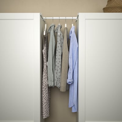 Closet with HJÄLPA rail hanging shirts, showing organization and adjustable storage.