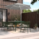 A HÖGÖN outdoor patio set with a large grey umbrella, four green wicker chairs around a table, perfect for relaxation or dining.