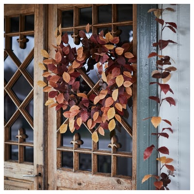 HÖSTAGILLE wreath: golden, red, rust leaves on brown stem, round, decorative autumn decor.