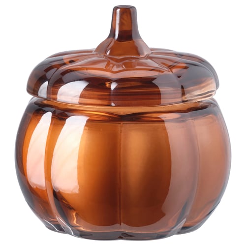 Brown glass pumpkin-shaped candle with lid, textured design.