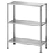A HYLLIS galvanized steel shelving unit, silver in color, with three tiers for versatile storage. Perfect for both indoor and outdoor use.