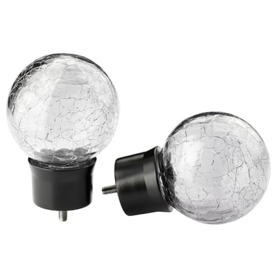 Pair of crackled glass sphere finials, dark base; INSEKTSMAL.