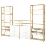 IVAR, a light wood modular storage system with white drawers and cabinets, ideal for organizing various spaces.