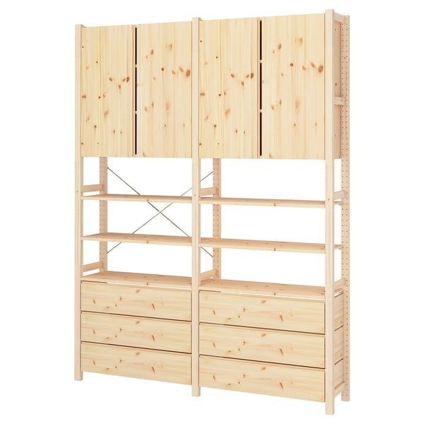 IVAR light wood storage unit with shelves and drawers for versatile storage.