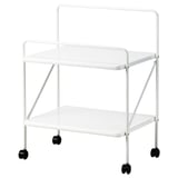 White JÄRLÅSA side table with wheels, two shelves, steel, epoxy finish, and black castors.