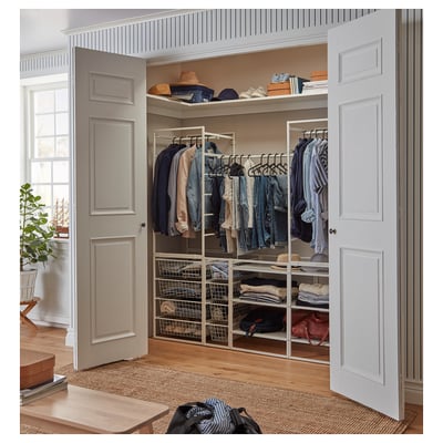 A white JONAXEL storage system with shelves and wire baskets, perfect for organizing clothes and accessories.