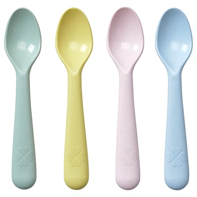 Four colored spoons with textured grips and heart emblems.
