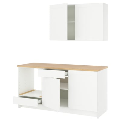 Modern white kitchen set with oak countertop, drawers, and cabinets for storage.