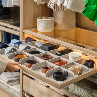 KOMPLEMENT: wooden drawer organizer with felt inserts, rectangular shape, gray & wood tones.