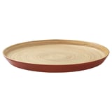 Circular bamboo serving tray with red edge & light wood grain pattern, elegant design.