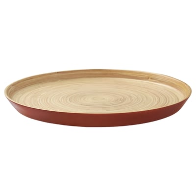 Circular bamboo serving tray with red edge & light wood grain pattern, elegant design.