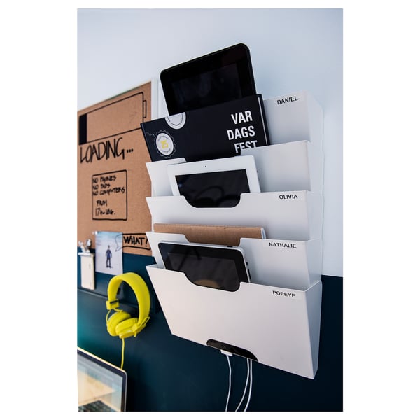 KVISSLE organizer with 4 slots, tablets, paper, headphones, bulletin board.