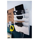 KVISSLE organizer with 4 slots, tablets, paper, headphones, bulletin board.