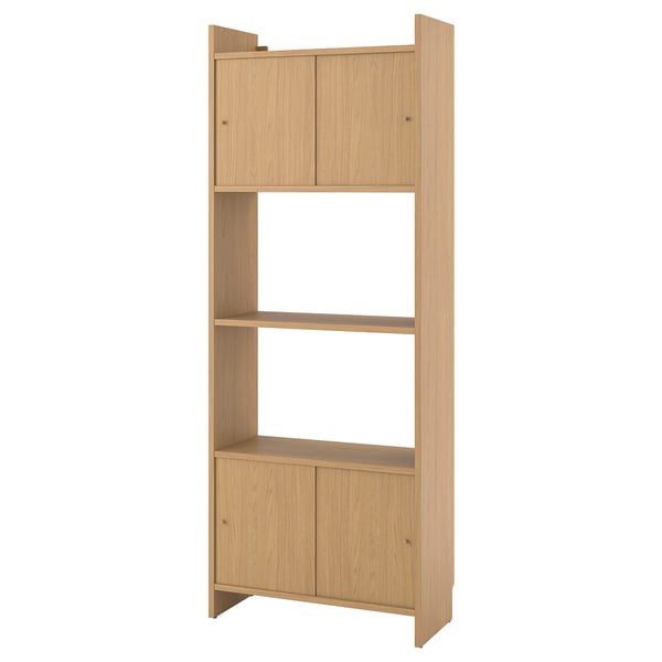 LÅDMAKARE: light wooden storage unit with open shelves and closed cabinets, combining visible and hidden storage.