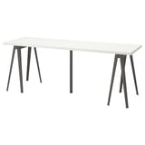 A white LAGKAPTEN desk with black metal legs.
