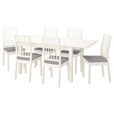 White 6-seater LANEBERG dining set with rustic ash finish, cushioned gray chairs.