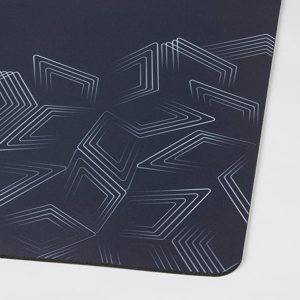 Dark grey gaming mouse pad with intricate white geometric patterns. Smooth surface, precise tracking.