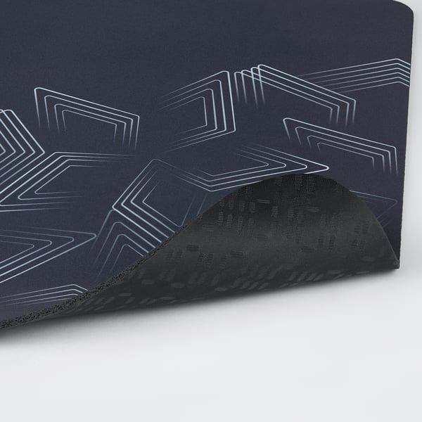 Recycled polyester mouse pad with smooth surface for gaming, non-slip rubber base shown partially.