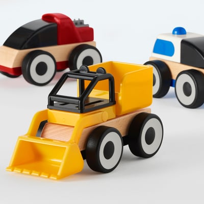Three colorful toy vehicles, yellow bulldozer, white van, and red fire truck. Crafted in plastic, wood, and metal. Ideal for imaginative play.