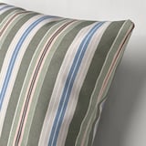 Striped cushion cover with zipper, muted colors, and scandi charm.
