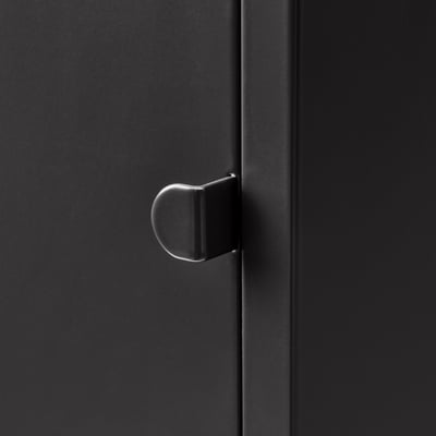 Black LIXHULT cabinet, single door, thin metal legs, durable epoxy/polyester finish.
