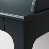 Sleek, modern desk with smooth, dark surface. Sturdy design, clean lines, and polished edges.