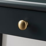 Blue drawer, gold handle, quality design.