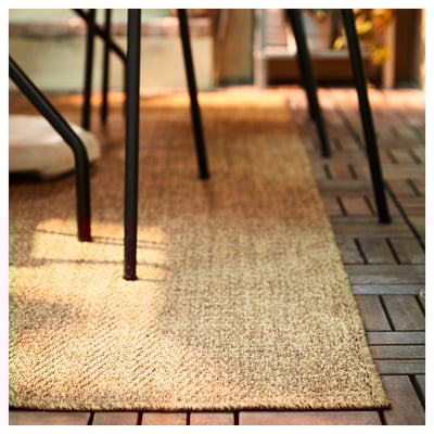 The LYDERSHOLM rug is a rectangle, brown, natural-fiber, durable, and easy-to-clean floor mat.
